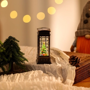 Close-up of vintage bronze phone booth Christmas lantern with tree and warm bokeh lights