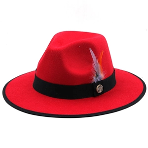 Classic red wool wide brim fedora hat with black ribbon, feather and anchor pin