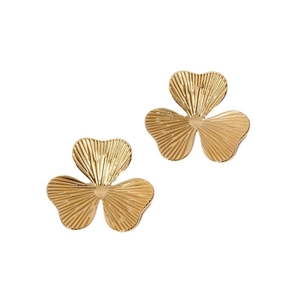 Minimalist gold clover stud earrings with textured radial patterns on white background