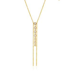 Detail of 18K gold stainless steel Y-shaped necklace with rhinestones and tassel chains