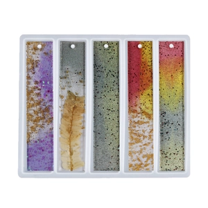 5-cavity rectangular silicone mold for DIY resin bookmarks with varied floral and glitter designs