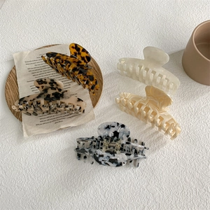 French style acetate hair claw clips in tortoise and marble patterns for thick hair