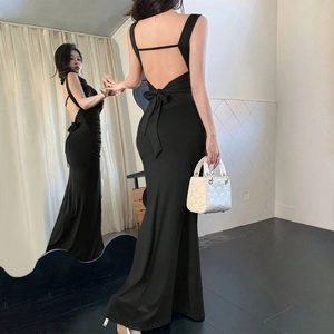 Slim fit black backless maxi dress with halter neck and bow detail for women