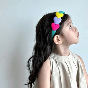 Sweet heart-shaped colorful sponge headband for kids featuring multi-color heart accents