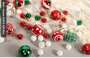 Detail of 42 red and green Christmas ornaments with glitter and hand-painted patterns