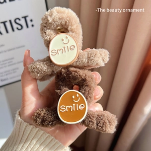 Plush smile face claw clips in brown faux fur for elegant autumn winter hairstyles