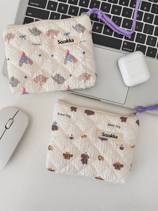Quilted cotton floral organizer bags with elephant and dog prints and zipper closures