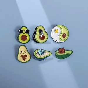 Creative avocado enamel pins set with astronaut and cartoon designs for clothing decoration