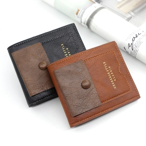 Detail of MenBense bi-fold wallets featuring gold stamped text and textured faux leather
