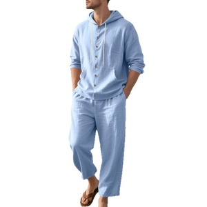 Men's light blue linen set featuring a long sleeve hooded shirt and matching trousers