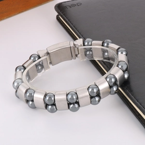Detail view of double-row hematite beads and brushed stainless steel links for men