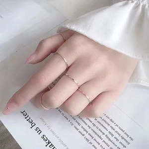Set of 5 minimalist rose gold stackable rings with hammered texture for a delicate look
