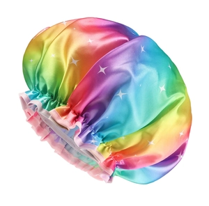 Detail of double-layer waterproof satin shower cap with rainbow gradient and star pattern