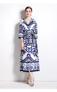 Detail of blue and white porcelain print dress with matching fabric belt and pocket