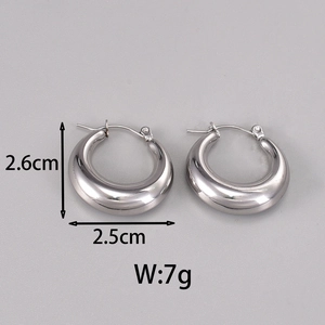 Close-up detail of silver-finish hollow geometric earrings with 2.5cm size markings