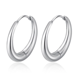 Detailed view of silver hoop earrings with a smooth polished finish and secure clasp