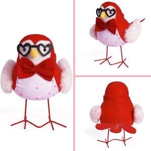 Detailed views of red plush bird decor with heart glasses and pink spotted belly pattern
