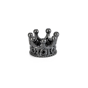 Macro detail of black metal crown charm bead with micro-pave cubic zirconia inlay