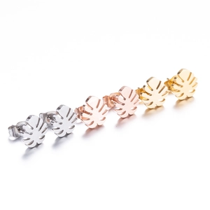 Three pairs of monstera leaf stud earrings in silver, rose gold and gold finishes