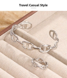 Silver anchor chain link jewelry set with open cuff bracelet and ring in a beige gift box