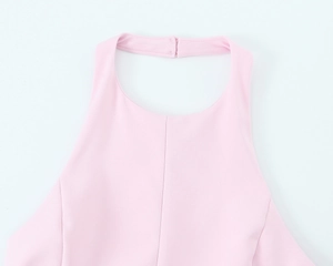 Detail view of pink halter top neckline featuring high-quality stitching and buckle closure
