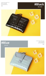 Detail of compact mini wallets with crocodile texture in black and light blue colors