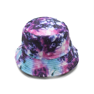 Detail view of colorful tie-dye sun hat showing multi-row brim stitching and fabric texture