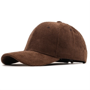 Detailed side view of dark brown corduroy texture on retro style baseball cap