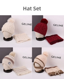 Detail view of winter knit hat and neck warmer sets in various solid colors and patterns