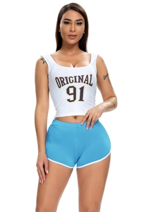 Close-up of white racerback tank top and sky blue athletic shorts with side binding