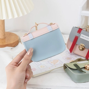Miniature faux leather coin purse keychain with metal clasp in pastel color combinations