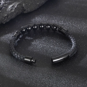 Men's black braided leather bracelet with magnetic clasp and polished black beads