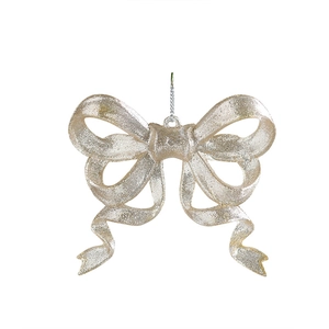 Sparkling gold glitter bow ornament for Christmas tree decoration on white background