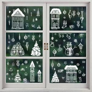 White Christmas window decals with snow house, reindeer and trees on glass window