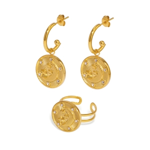 Golden celestial jewelry set with crescent moon and star relief on hammered coins