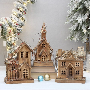 Set of three wooden glowing Christmas cabin ornaments with gold glitter accents