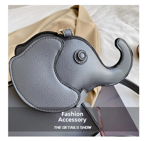 Macro detail of elephant-shaped grey leather bag showing premium litchi grain texture