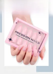 Close-up of translucent pink almond press-on nails in a professional retail box