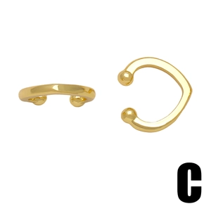 Minimalist gold vintage metal ear cuffs with polished C-shape design and ball ends