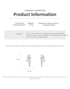 Detail showing white flower drop earrings with pearls and zircon water drop pendants