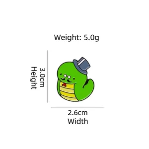 Cartoon green snake enamel brooch wearing a black top hat and glasses on white background