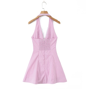 Detail of pink striped halter dress back with elastic shirring and white lace trim