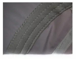 Detail of the widened sweatband with double stitching on dark gray sun hat