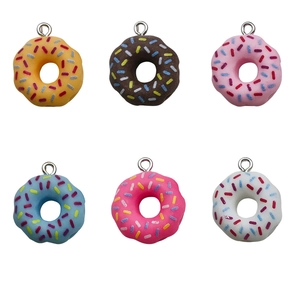 Set of six colorful resin donut pendants with metal rings for DIY jewelry making and crafts