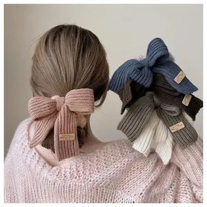 Chic knit bow hair scrunchies with cute bear patches for elegant autumn and winter styling