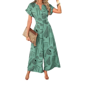 Women's V-neck short sleeve jumpsuit with green geometric print and wide leg style