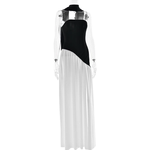 Detail of elegant black and white backless maxi dress with a matching scarf accessory