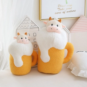 Creative bull beer plush pillow toy set in two sizes on a cozy sofa for home decor