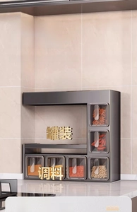 Wall-mounted kitchen spice organizer with six transparent boxes and top storage shelf