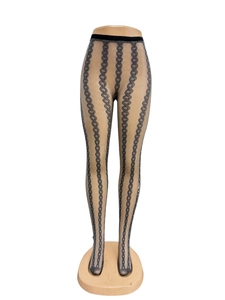 Detail of grey diamond pattern fishnet tights featuring wavy jacquard knit and elastic waist
